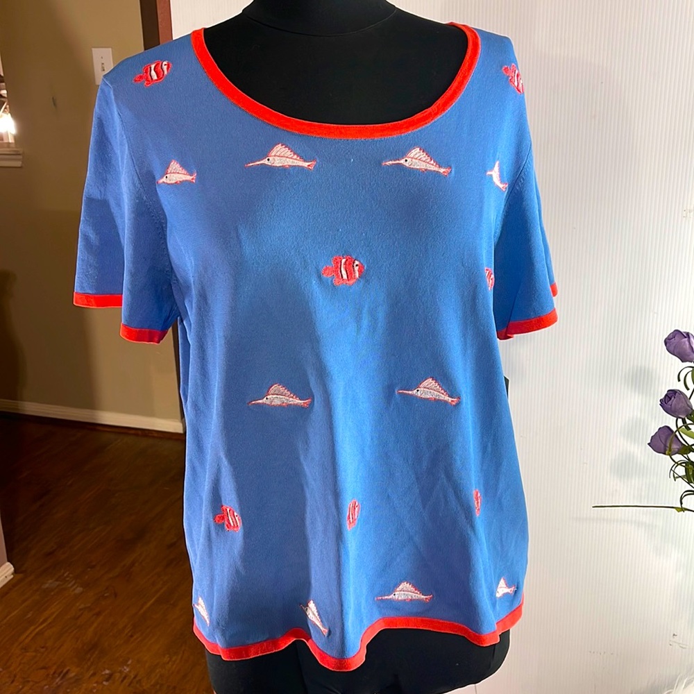 Beautiful women blue shirt with nice fish on it like the sea